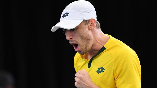 John Millman of Australia celebrates winning a game during the Davis Cup Qualifier singles match. Picture: Mark Brake/Getty Images.