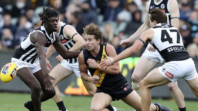 Matthew Snook under pressure from Martin Frederick and Tobin Cox during the SANFL grand final. Picture SARAH REED