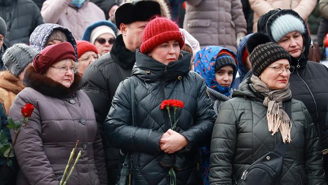 Mourners lay flowers in memory of more than 60 Russian soldiers killed in a Ukrainian strike in Samara. Picture: AFP