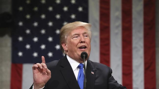 President Donald Trump delivers his first State of the Union address in the House chamber of the U.S. Capitol to a joint session of Congress Tuesday, Jan. 30, 2018 in Washington. (Win McNamee/Pool via AP)