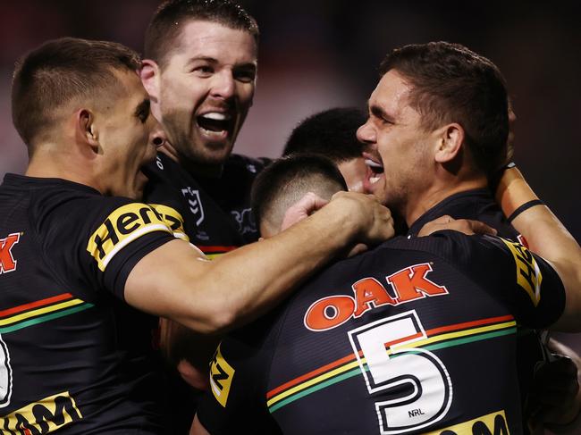 PENRITH, AUSTRALIA - JUNE 03: Chris Smith of the Panthers celebrates with team mates after scoring a try during the round 13 NRL match between the Penrith Panthers and the Canterbury Bulldogs at BlueBet Stadium on June 03, 2022, in Penrith, Australia. (Photo by Matt King/Getty Images)