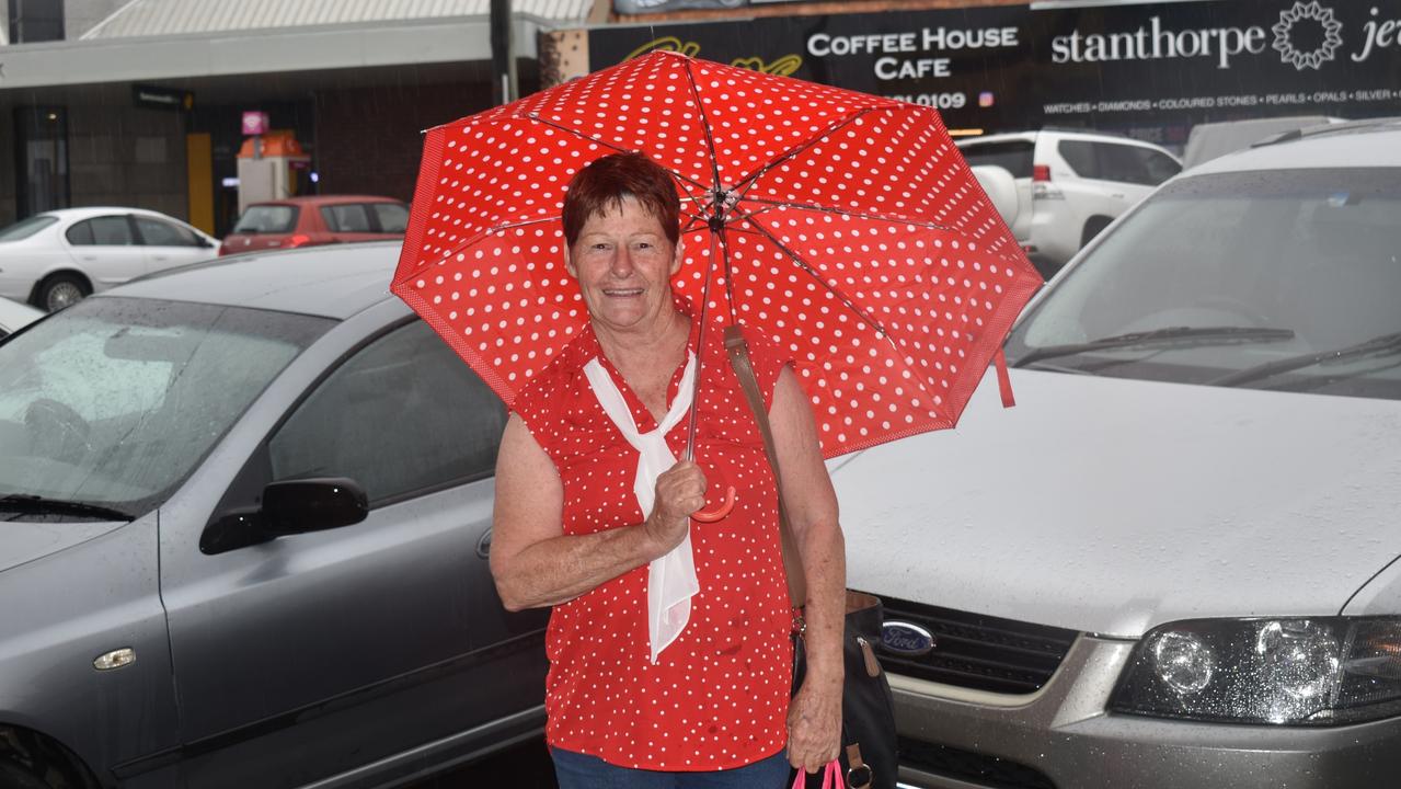 Vikki Skinner from Tenterfield just bought herself a new umbrella for the rain. Photo: Madison Mifsud-Ure / Stanthorpe Border Post