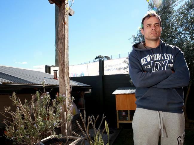 Tim Pace in his backyard in Karingal Cres, Frenchs Forest. Picture: Damian Shaw