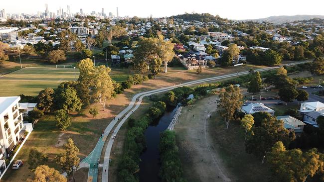 Stunning drone imagery shows dozens of cyclists using the Kedron Brook Bikeway in what its photographer believes will become an "historical document" illustrating how the COVID-19 pandemic helped us rediscover our love of walking and cycling. Picture: Supplied