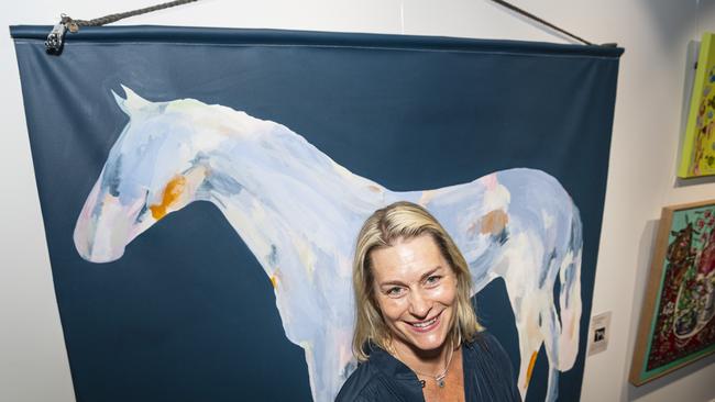 Tasmanian artist and The Next Big Thing finalist Harriet Links with her work Head in the Clouds at The Toowoomba Gallery, Friday, March 1, 2024. Picture: Kevin Farmer