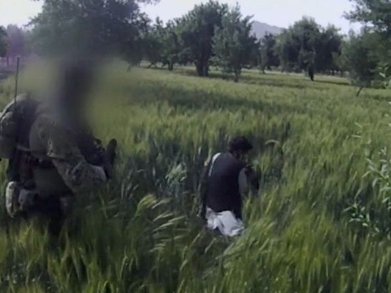 A screen grab from footage showing an Australian SAS soldier shooting and killing an unarmed man at close range in Afghanistan. Source: Four Corners