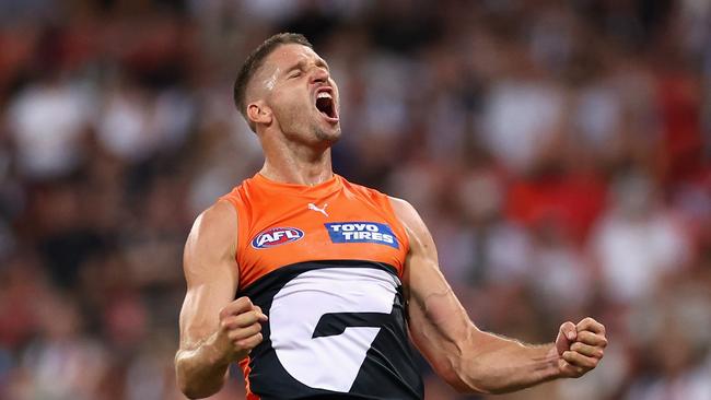 SYDNEY, AUSTRALIA – MARCH 09: Jesse Hogan of the Giants celebrates kicking a goal during the AFL Opening Round match between Greater Western Sydney Giants and Collingwood Magpies at GIANTS Stadium, on March 09, 2024, in Sydney, Australia. (Photo by Cameron Spencer/Getty Images)