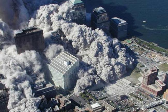 The dust and debris is about to invade New York after the attack. ABC News in the US recently obtained these images through Freedom of Information Act request in 2009 with the National Institute of Standards and Technology. Picture: Det. Greg Semendinger/NYC Police Aviation Unit.