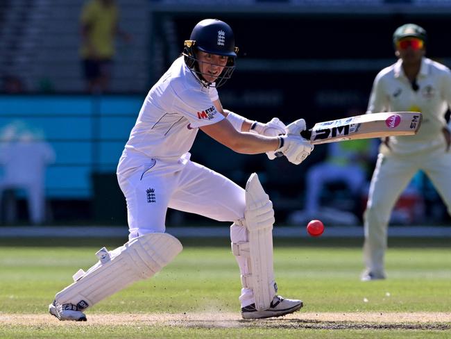 England's Heather Knight plays a shot on the third day of the Women's Ashes cricket Test match between Australia and England at the Melbourne Cricket Ground (MCG) in Melbourne on February 1, 2025. (Photo by William WEST / AFP) / --IMAGE RESTRICTED TO EDITORIAL USE - STRICTLY NO COMMERCIAL USE--