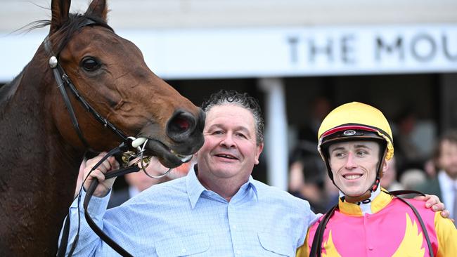 Trainer Kevin Daffy celebrates with first metro win with jockey Ben Allen after Oh Too Good saluted at Flemington. Picture: Getty Images