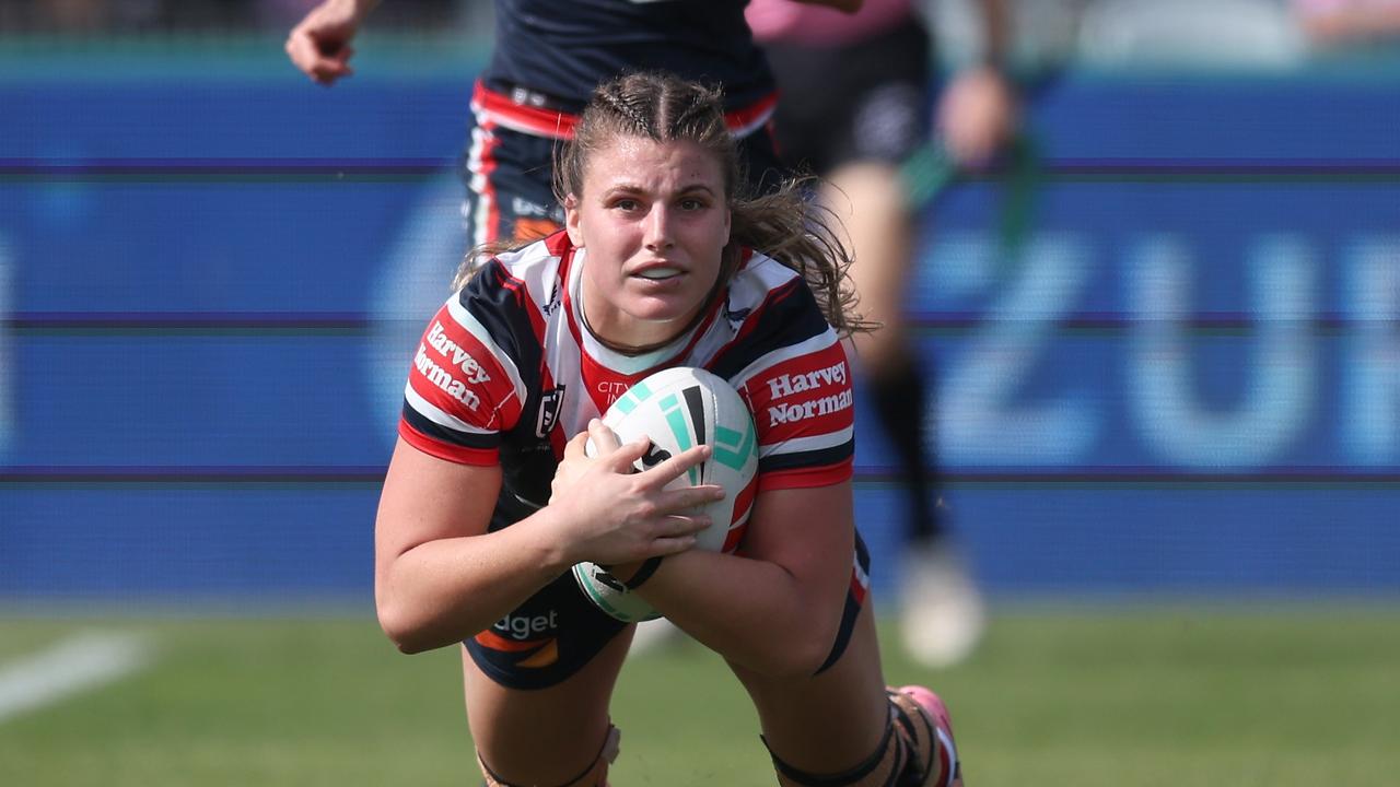 You could see the pain on her face as Jess Sergis scored a try just minutes after she suffered a serious knee injury. Picture: Scott Gardiner/Getty Images