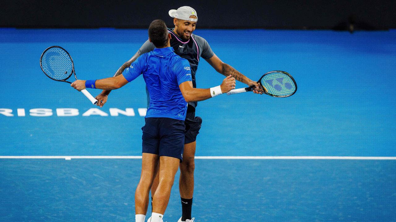 The unlikely duo are proving to be a doubles force. (Photo by Patrick HAMILTON / AFP)