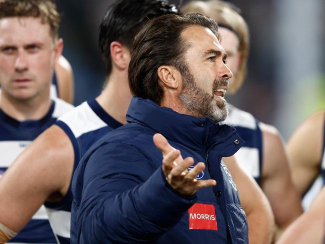 GEELONG, AUSTRALIA – MAY 10: Chris Scott, Senior Coach of the Cats addresses his players during the 2024 AFL Round 09 match between the Geelong Cats and Port Adelaide Power at GMHBA Stadium on May 10, 2024 in Geelong, Australia. (Photo by Michael Willson/AFL Photos via Getty Images)