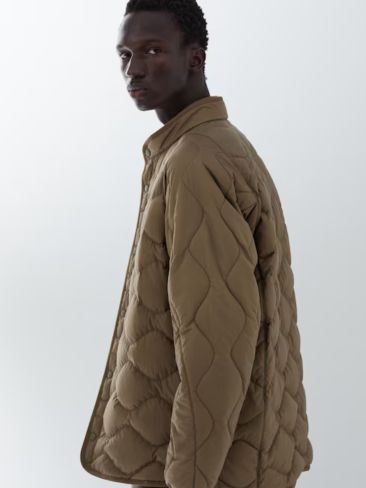 White Mountaineering Recycled Hybrid Down Jacket. Picture: Uniqlo