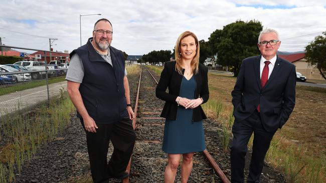 Michael Hangan, of the Hobart Northern Suburbs Rail Action Group, newly elected independent MP Kristie Johnston and Federal Lcark MP Andrew Wilkie on the rail corridor. Picture: Nikki Davis-Jones