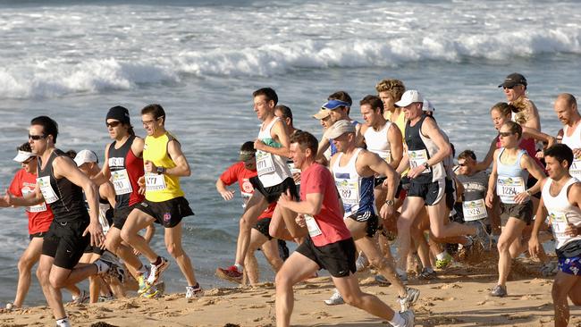 Runners on Long Reef Beach in 2007. Picture: Virginia Young