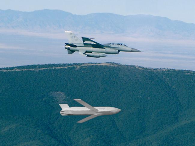 UNDATED : Joint Air Surface Stand-Off Missile (JASSM) hovering above aircraft in undated image.