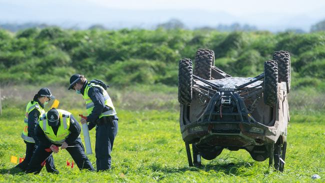 A young girl has tragically died and another was seriously injured after an off-road buggy rolled on a property in Gippsland on Saturday afternoon. Police Major Collision Investigation Unit inspect the site. Picture: Tony Gough