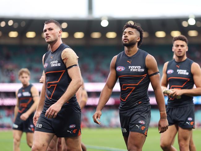 SYDNEY, AUSTRALIA - MAY 04: Kieren Briggs (L) and Connor Idun (R) of the Giants look dejected after the round eight AFL match between Sydney Swans and Greater Western Sydney Giants at SCG, on May 04, 2024, in Sydney, Australia. (Photo by Matt King/AFL Photos/via Getty Images )