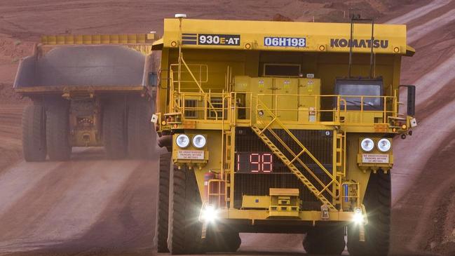 Trucks at the Goonyella Riverside mine site. Picture: Christian Sprogoe