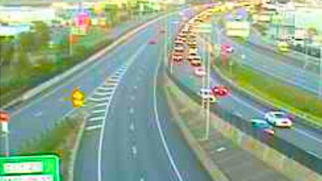 Police were at the scene at Granard Rd and the Ipswich Mwy as traffic started to bank up during the peak-hour rush. Picture: TMR