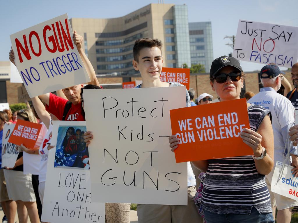 Demonstrators gather to protest the arrival of President Donald Trump outside Miami Valley Hospital in Dayton, Ohio. Picture: AP