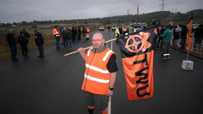 ON STRIKE: TWU delegate Pat Spaulding walks off the job at Toll. Picture: Kenji Sato