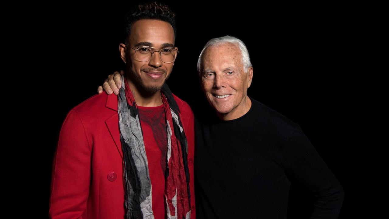 With fashion designer Giorgio Armani in 2017. Supplied