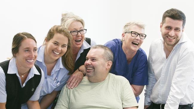 Left to right Emma Jolly, Mikaela Ferguson, Sharon Aspinall, Sheridan Brady and Dr Maziar Razavian (Middle) Buddy Miller at Northern Beaches Hospital. Picture: Tim Pascoe.