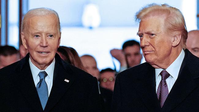 US President Joe Biden (L) and President-elect Donald Trump arrive for the inauguration ceremony where Donald Trump will sworn in as the 47th US President in the US Capitol Rotunda in Washington, DC, on January 20, 2025. (Photo by Melina MARA / POOL / AFP)