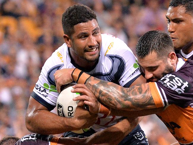 BRISBANE, AUSTRALIA - MARCH 22: Nene Macdonald of the Cowboys is caught in the in-goal area during the round two NRL match between the Brisbane Broncos and the North Queensland Cowboys at Suncorp Stadium on March 22, 2019 in Brisbane, Australia. (Photo by Bradley Kanaris/Getty Images)