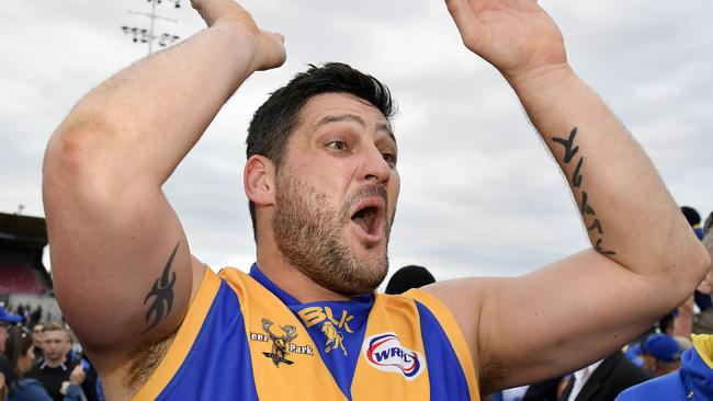 Brendan Fevola celebrates Deer Park’s 2016 premiership. Picture: Andy Brownbill