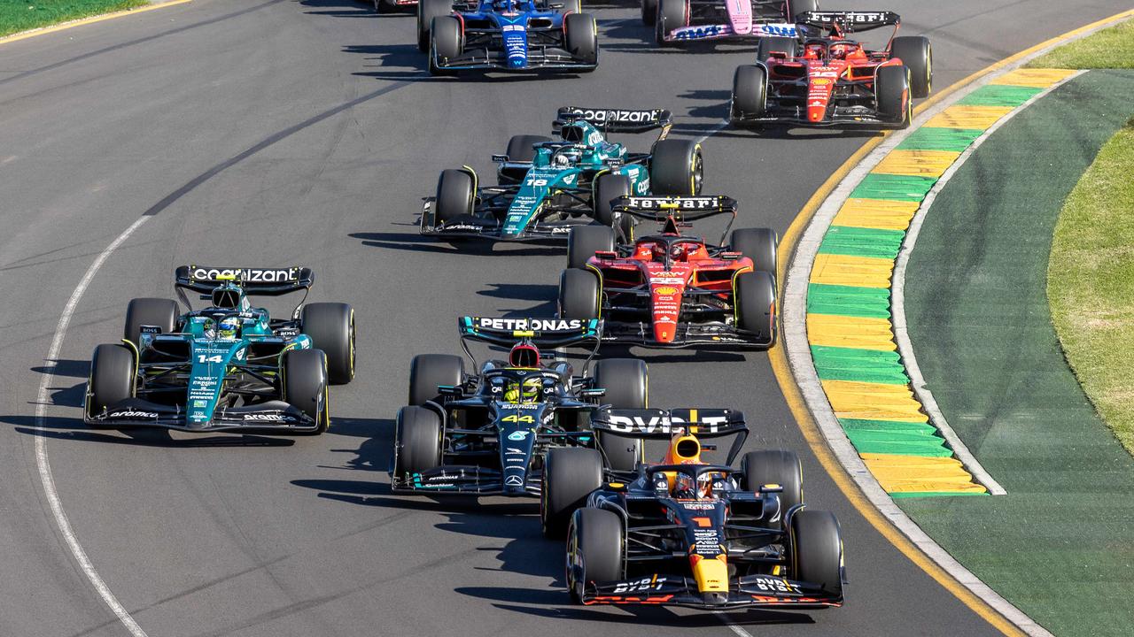 F1 Melbourne Grand Prix 2023. GP. Albert Park. Sunday. Max Verstappen leads Lewis Hamilton and Fernando Alonso through out of turn . Picture: Jake Nowakowski