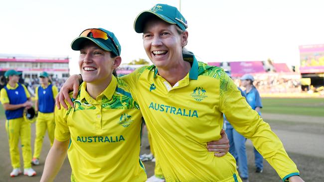 Megan Schutt and Meg Lanning celebrate after winning the gold medal at the Birmingham 2022 Commonwealth Games. Picture: Alex Davidson / Getty Images