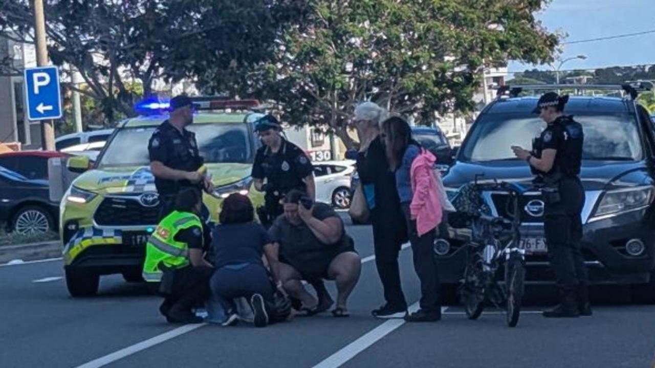 ‘Whack’: Cyclist slams into door of parked car