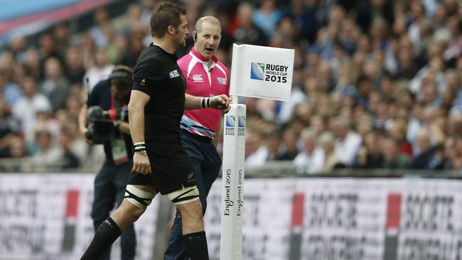 All Blacks captain Richie McCaw walks off the pitch after receiving a yellow card against Argentina.