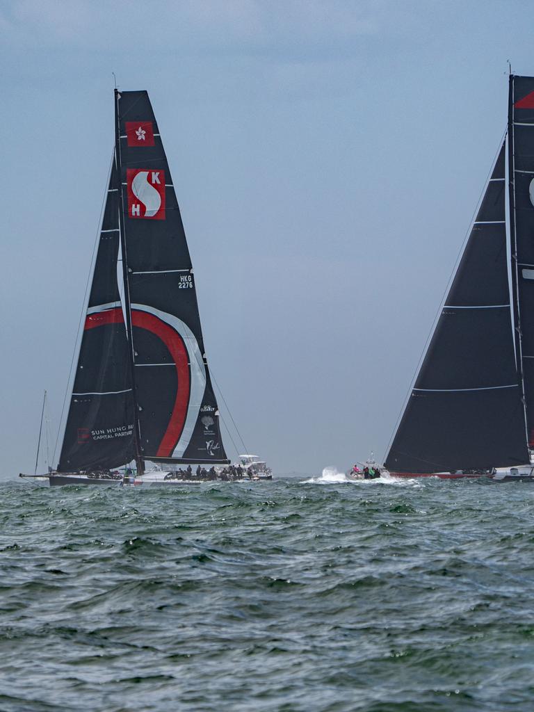 Super Maxis Andoo Comanche (R) and SHK Scallywag (L) sail towards Sydney Heads. Photo by Andy Cheung/Getty Images.