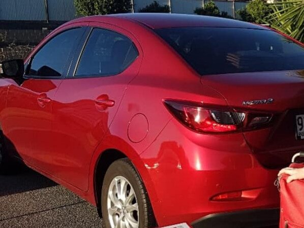 STOLEN: The family's red Mazda 2 is now believed to be painted white and missing its number plates.