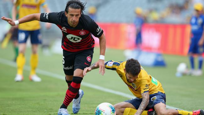 Daniel Georgievski of the Wanderers shrugs off the challenge from Daniel De Silva Picture: Getty Images