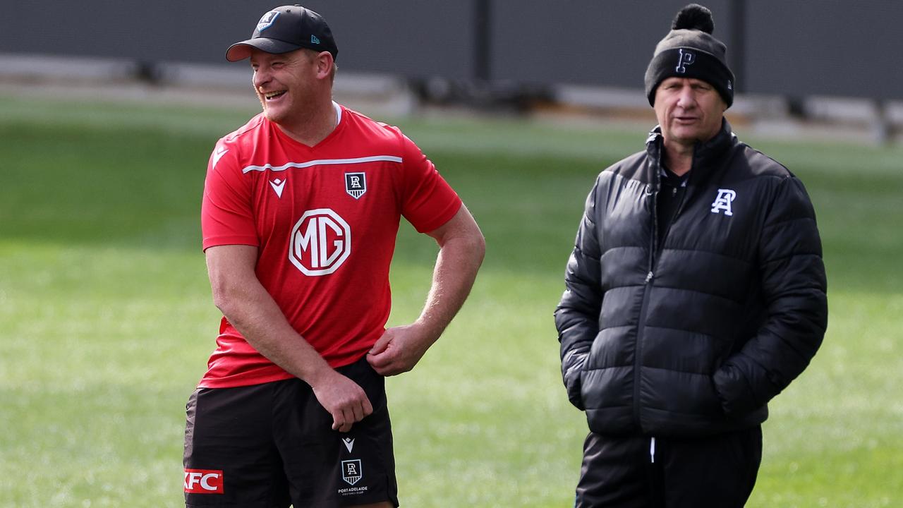 Michael Voss with Port Adelaide coach Ken Hinkley. Picture: Daniel Kalisz/Getty Images