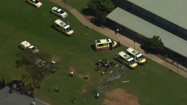 Students were carried from the scaffolding by their peers before ambulance crews arrived. Picture: 7 News.