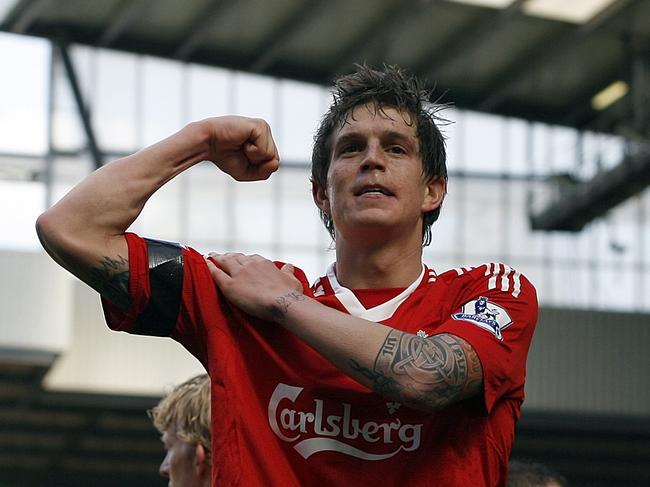 Liverpool's Daniel Agger, center, reacts after scoring a goal during their English Premier League soccer match against Blackburn at Anfield Stadium, Liverpool, England, Saturday, April 11, 2009. (AP Photo/Paul Thomas) ** NO INTERNET/MOBILE USAGE WITHOUT FOOTBALL ASSOCIATION PREMIER LEAGUE (FAPL) LICENCE. CALL +44 (0) 20 7864 9121 or EMAIL info@football-dataco.com FOR DETAILS **