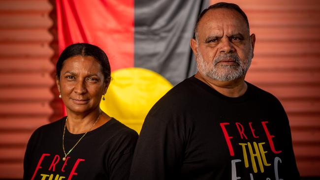 Nova Peris and Michael Long stand with the Aboriginal Flag ahead of the AFL's Dreamtime Round. Picture: Che Chorley