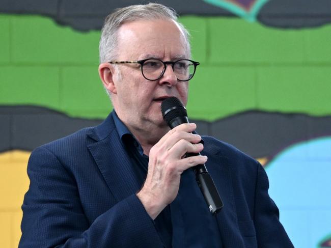 Australian Prime Minister Anthony Albanese speaks to students as he attends a school assembly at Stuart Park Primary in Darwin, NT, Wednesday, March 13, 2024. (AAP Image/Lukas Coch) NO ARCHIVING