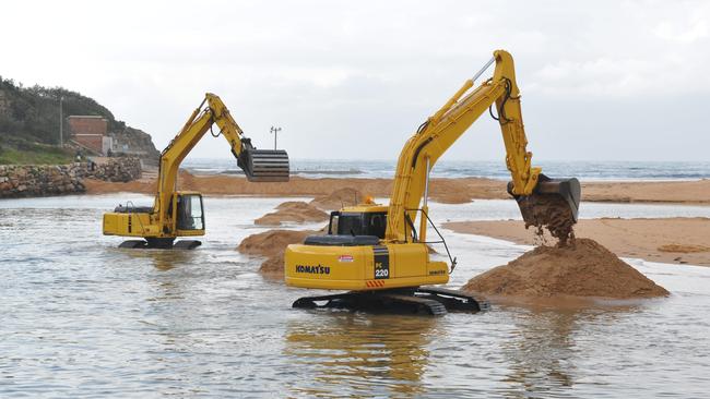 Sand being removed from Narrabeen Lagoon east of the Ocean St bridge in 2018. Photo Manly Daily