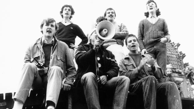 A young Anthony Albanese, left, leads students in a protest atop the University of Sydney clock tower in 1983.