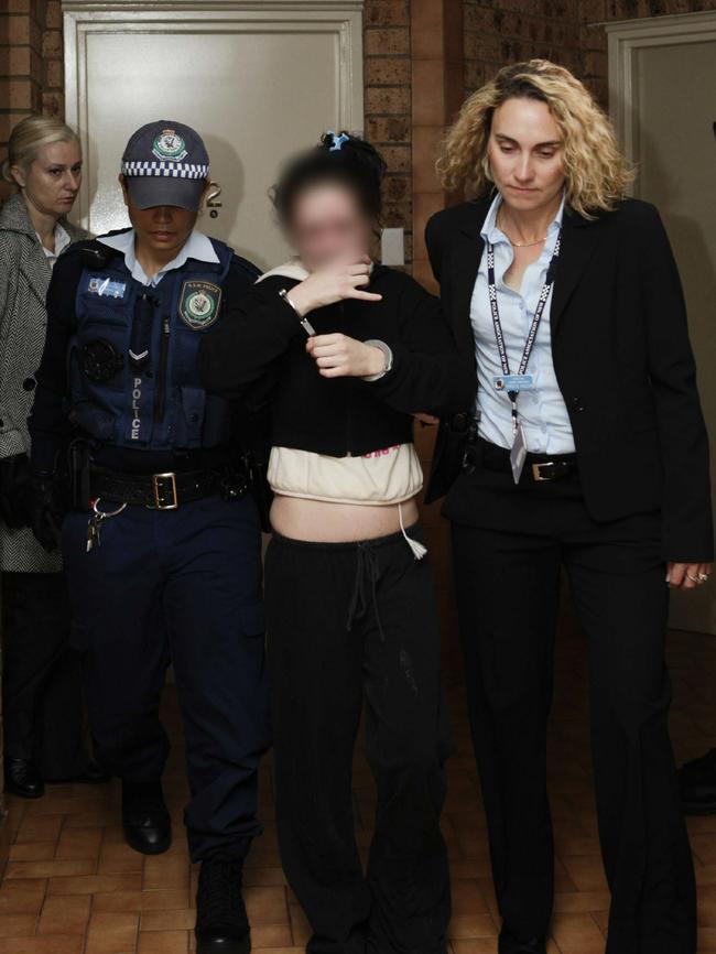 One of the sisters in custody after her arrest