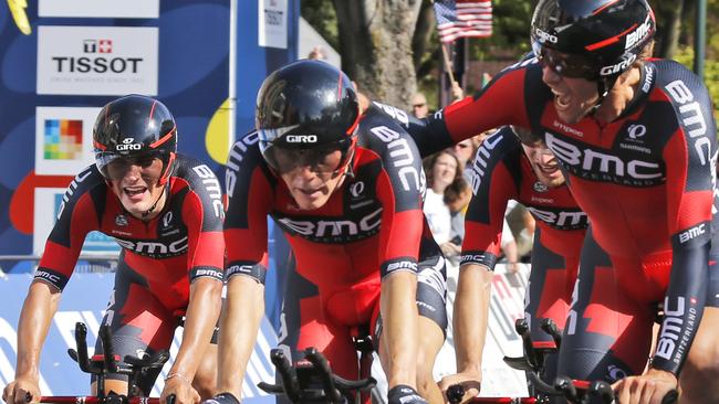 Rohan Dennis, centre, celebrates with fellow BMC racing team members after winning the men's team time trials at the UCI Road World Championships. Picture: Steve Helber