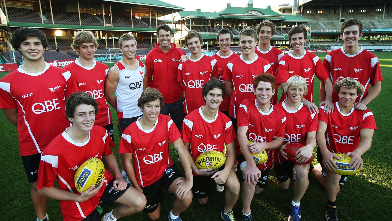 Isaac Heeney (second from right, front row) was part of the Swans junior academy. Jordan Foote (second from left, back row) is now a Sydney teammate.