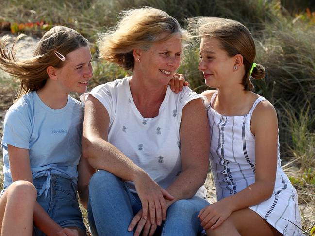 Katrina Condie lost her Conjola Park home in the New Year's Eve fire. Pictured with daughters Sienna 14 (L) and Grace 11. Picture: Toby Zerna